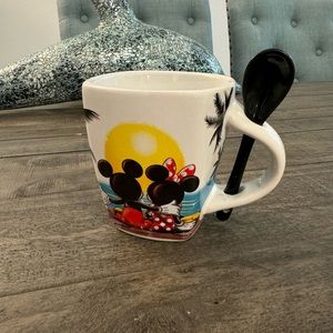 Disney tea mug with spoon.
